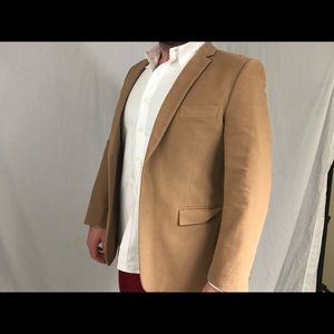 Men’s Versace Tan colored suit.